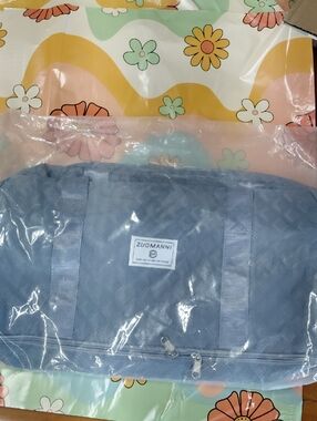 Light Blue Quilted Travel Duffel Bag